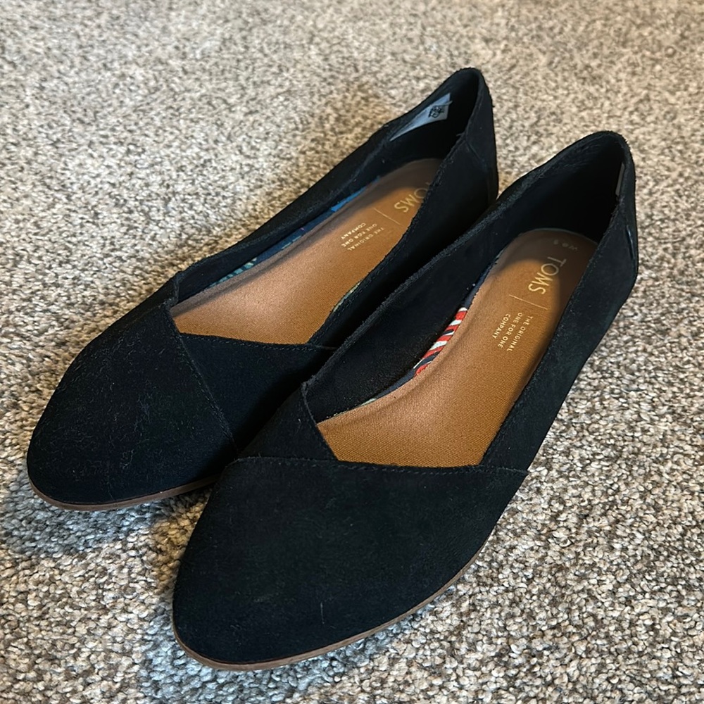 Good condition TOMS black Jutti Neat Flat